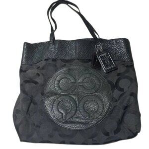 Coach Julia Tote bag in black canvas and leather with a signature C logo pattern